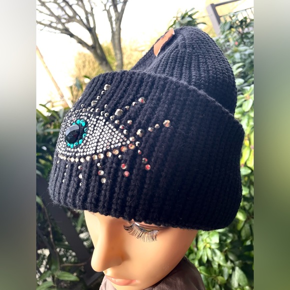 Black Beanie with Eye Design by Kurt Geiger.
NWOT - Picture 4 of 17